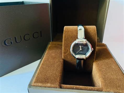 gucci 1400l watch price|gucci ladies bangle watch.